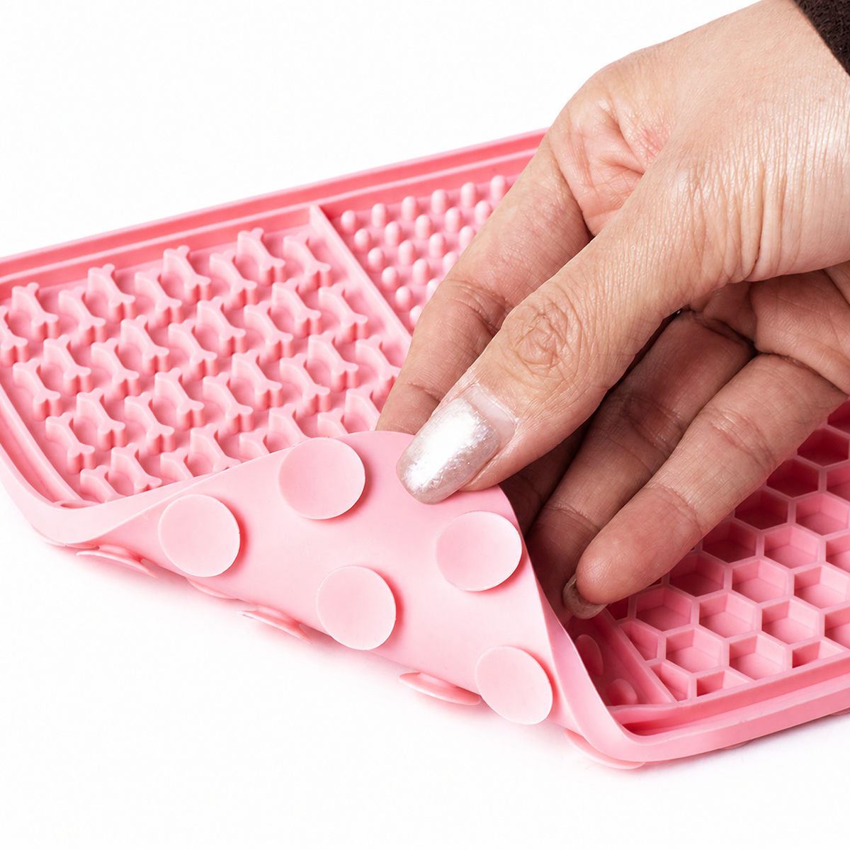 Back of the CalmBath lick mat showing suction cups