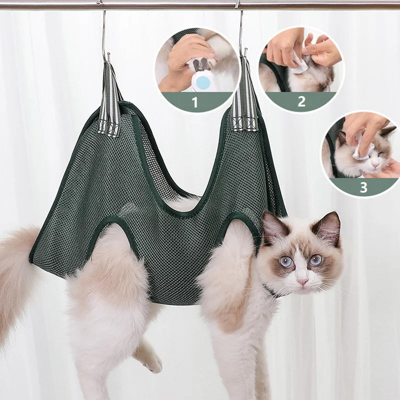 Cat supported in a grooming hammock